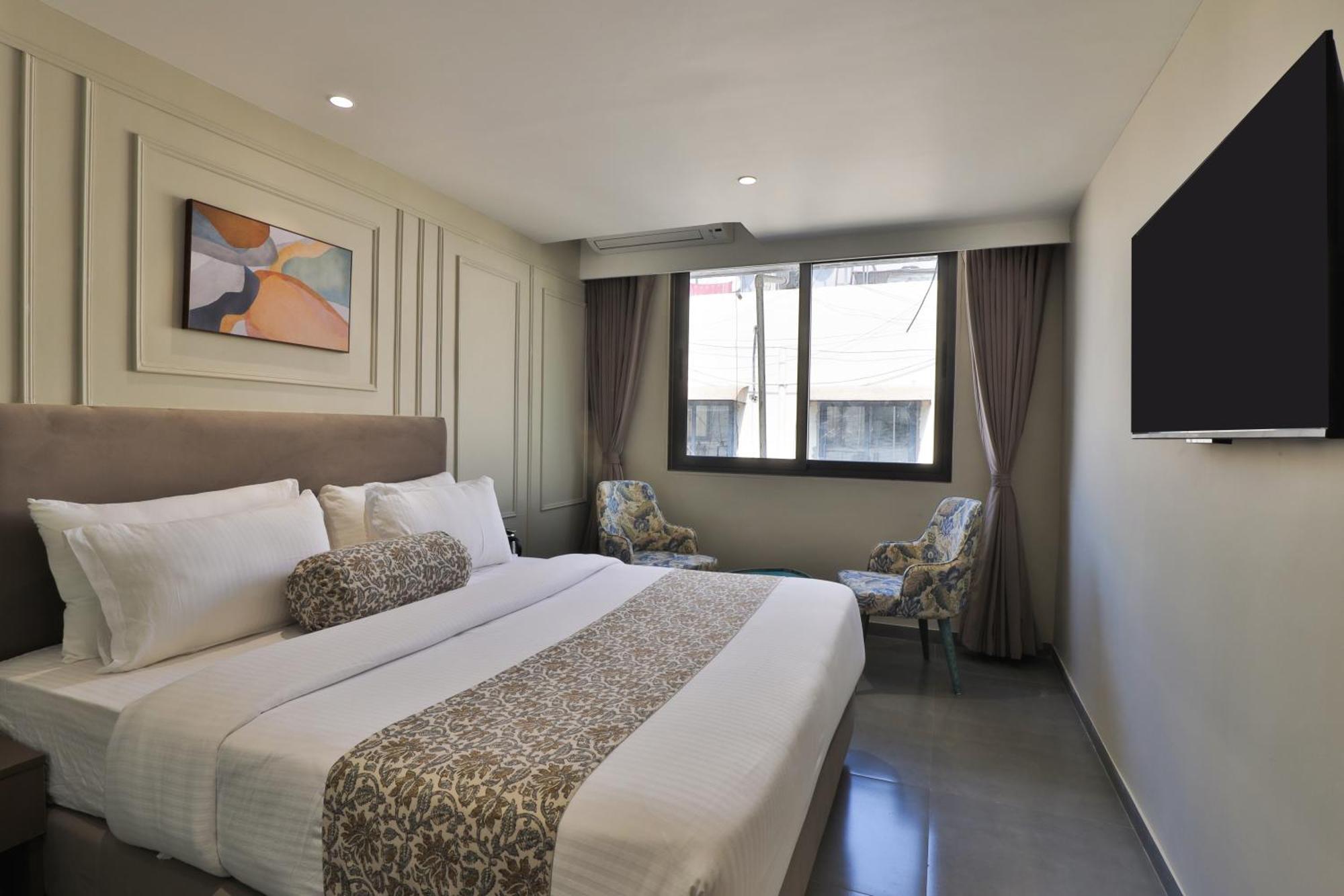 Hotel The Grand Suites 阿穆达巴 外观 照片